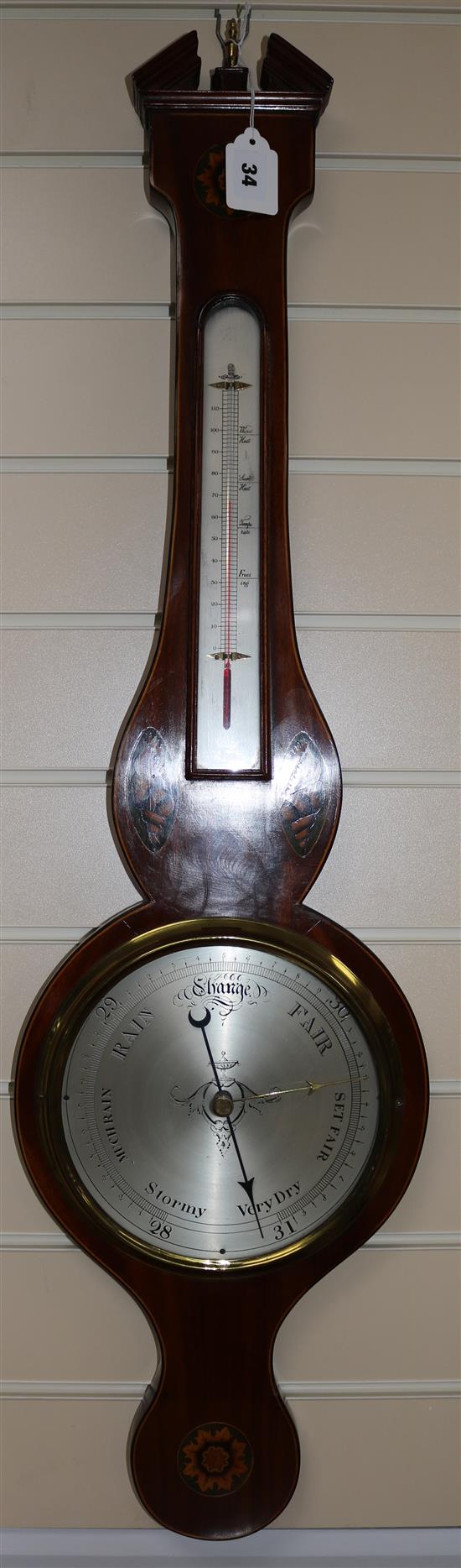 An inlaid mahogany wheel barometer